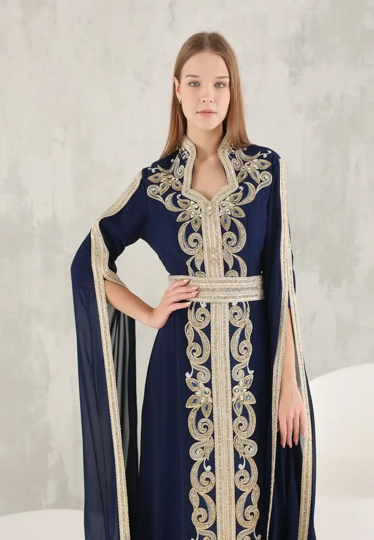 An ornate Moroccan kaftan with luxurious details and glossy gold threads