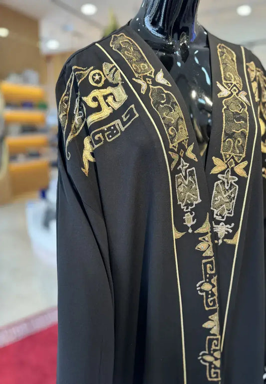 Beauty and elegance abaya decorated with distinctive golden lines